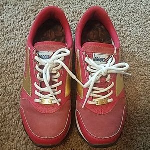 Brooks pink and gold sneakers